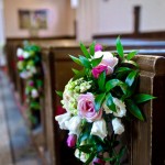 Floral pew ends for a wedding